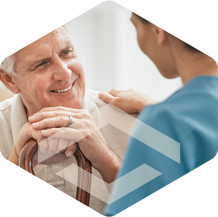 Caregiver comforting an elderly resident