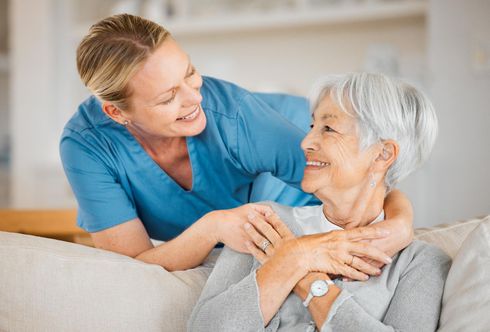 Therapist working with an elderly patient
